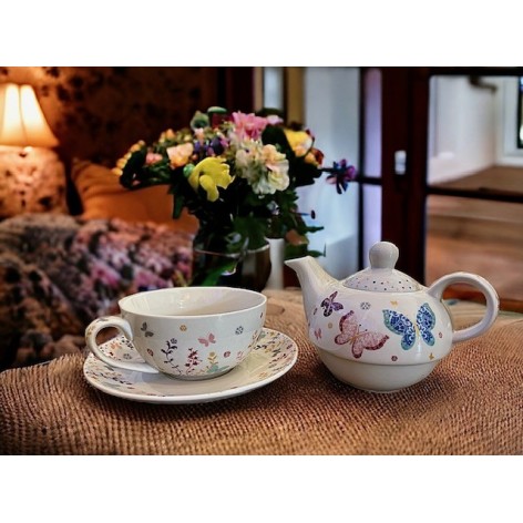 Porcelain teapot with butterflies