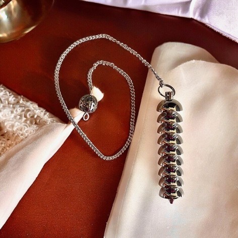 Pendule amulette en laiton