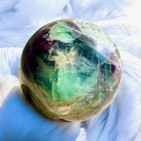 Natural fluorite sphere, angel feathers
