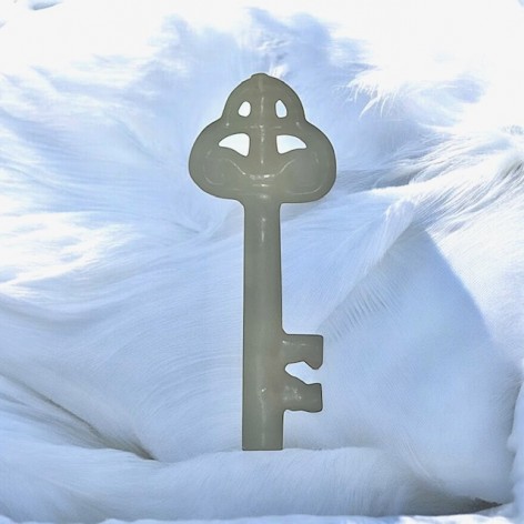 White key figurative candle