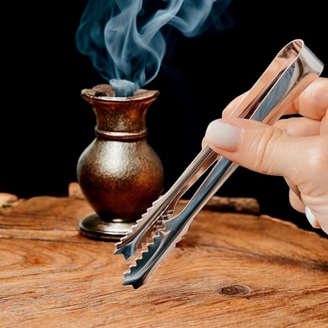 Pince argentée pour charbon